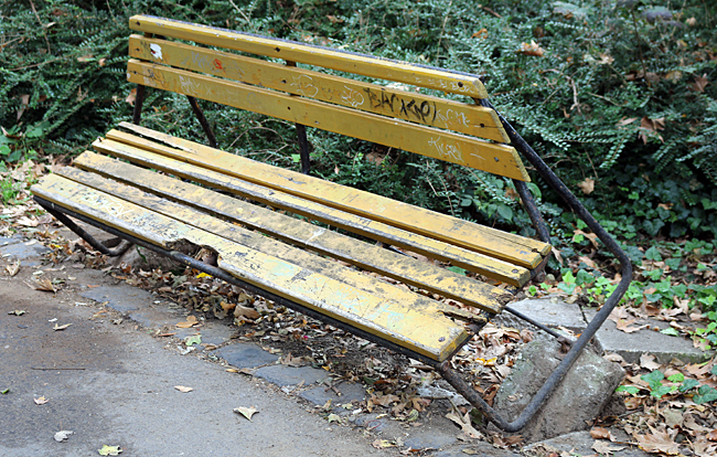 This bench looks like it is on its — er — last legs. Photograph ©2014 by Brian Cohen.