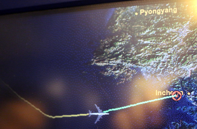 This one is for you, George. Notice how the airplane on which I was a passenger had to go around the air space of North Korea, whose name of the capital city appears on the map. Photograph ©2014 by Brian Cohen.