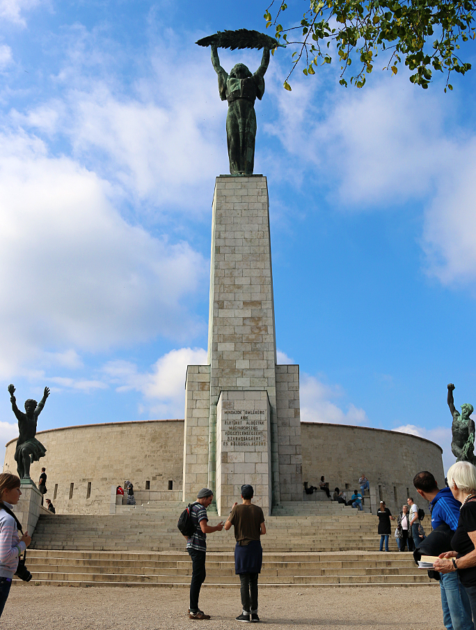 Liberty Statue — also known as Freedom Statue — at the top Gellért Hill with the Citadella behind it. Photograph ©2014 by Brian Cohen.