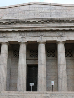 a stone building with columns