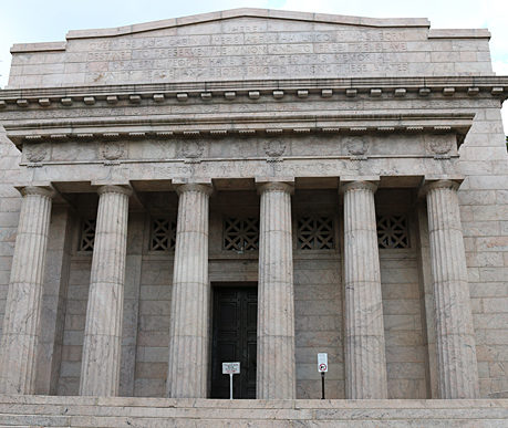 a stone building with columns