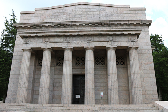a stone building with columns