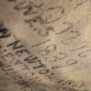 writing on a rock wall