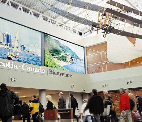 a group of people walking in a building