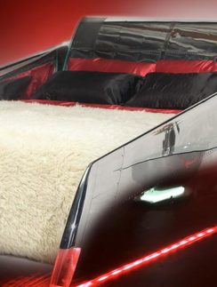 a bed with a white and black bed