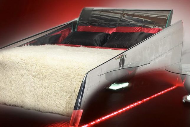 a bed with a white and black bed