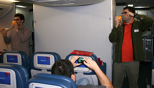 a man taking a picture of another man