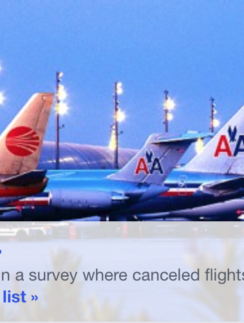 a group of airplanes parked at an airport