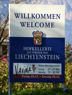 a sign with a blue and white text
