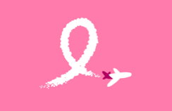 a pink ribbon with a plane flying in the sky