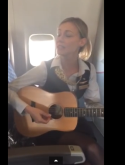 a woman playing a guitar