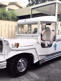 a white vehicle with a roof