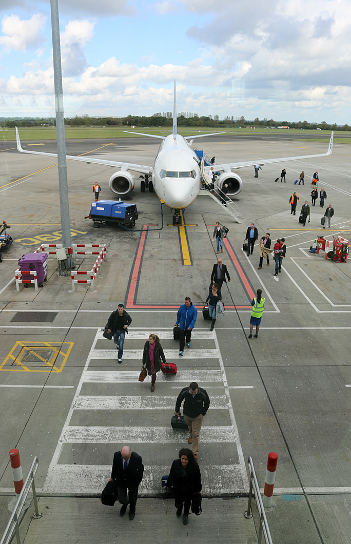Ryanair airplane at gate passengers