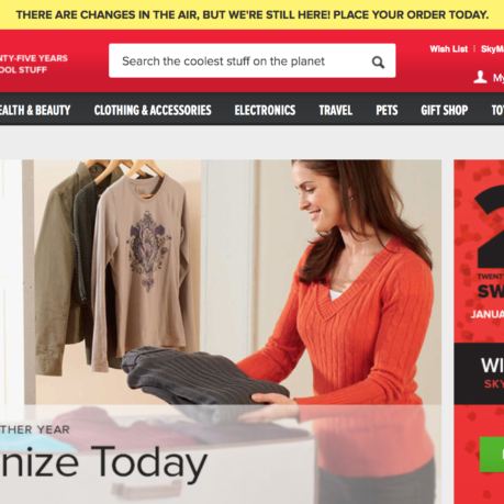 a woman holding a folded shirt