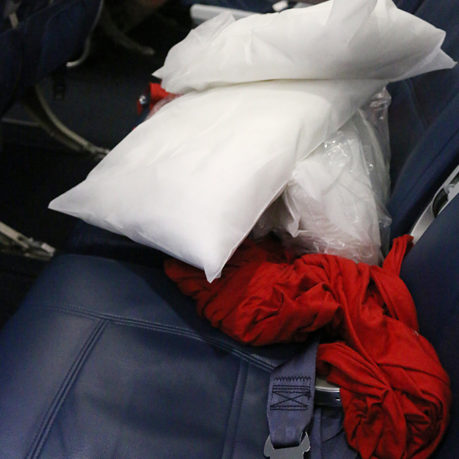 Lie flat row of economy class seats