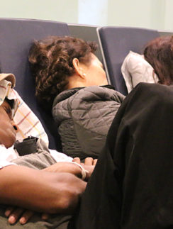 People sleeping airport Abu Dhabi