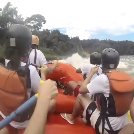 a group of people in a raft