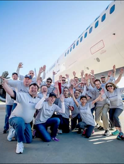 a group of people posing for a photo