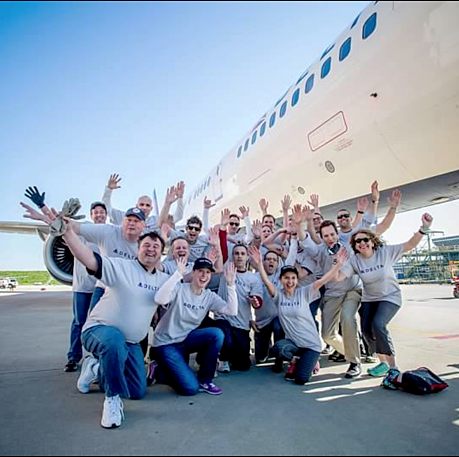 a group of people posing for a photo