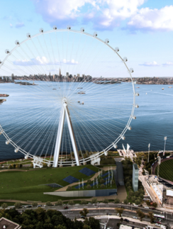 a ferris wheel next to water