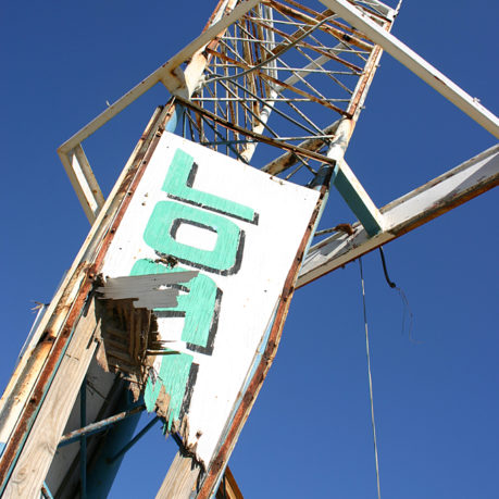 a sign on a metal structure