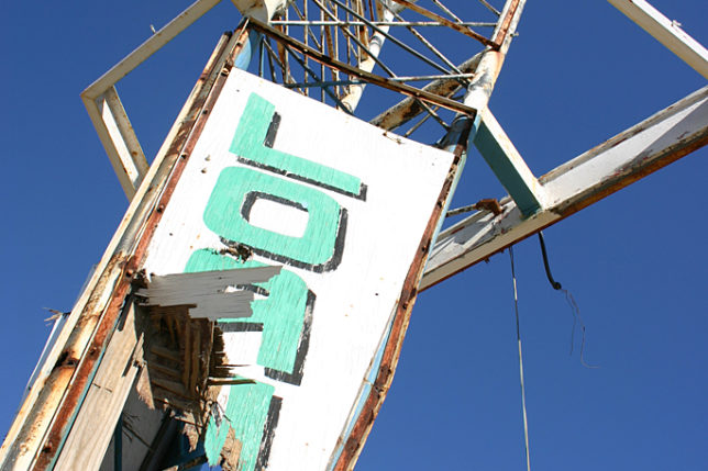 a sign on a metal structure