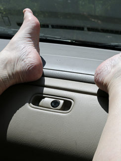 Feet on dashboard