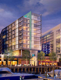 a group of people walking by a dock