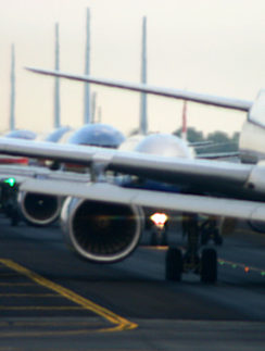 Airplanes lined up on runway