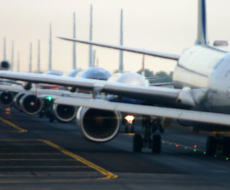 Airplanes lined up on runway