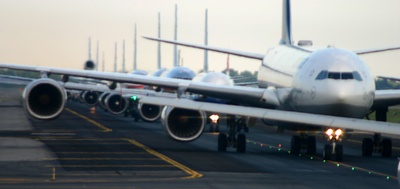 Airplanes lined up on runway