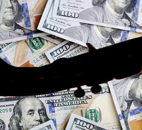 Airplane Silhouette Over $100 Bills