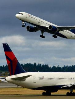 Delta Air Lines airplanes on runway and tarmac in Seattle