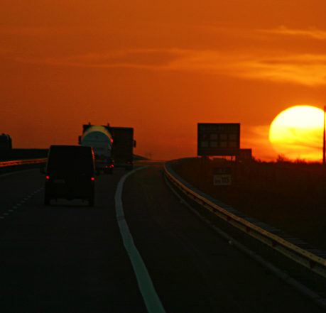 Sunset over highway in Romania