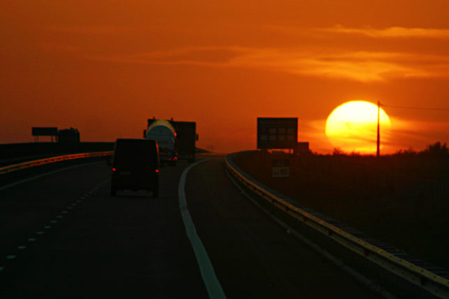 Sunset over highway in Romania