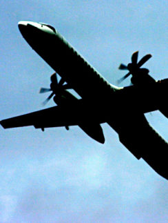 Propeller airplane ascending