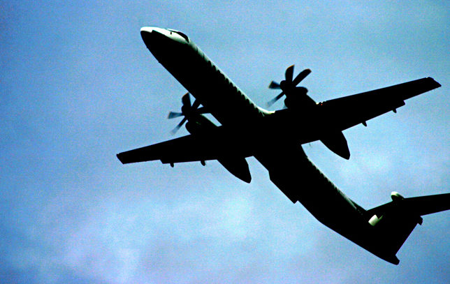 Propeller airplane ascending