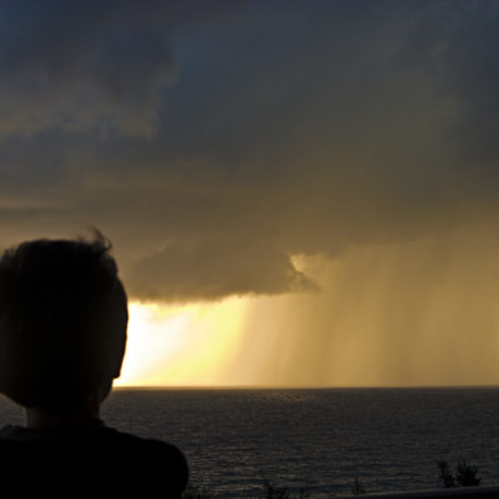 Boy sunset thunderstorm