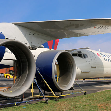 Boeing 747-451 Next to a McDonnell Douglas DC-9-51 Delta Air Lines