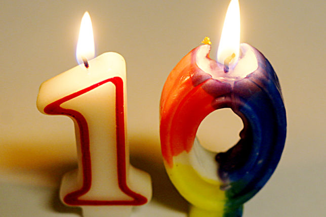The Gate ten years 10 candles lit