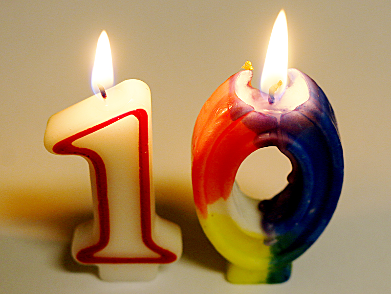 The Gate ten years 10 candles lit