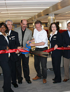 Cutting the ribbon at Concourse D Delta Sky Club Atlanta