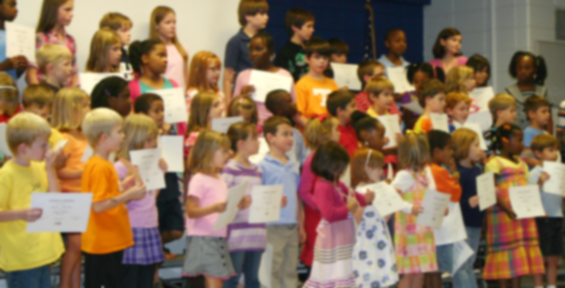 Children on stage in elementary school