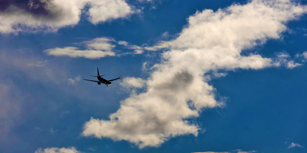 an airplane flying in the sky