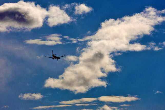 an airplane flying in the sky