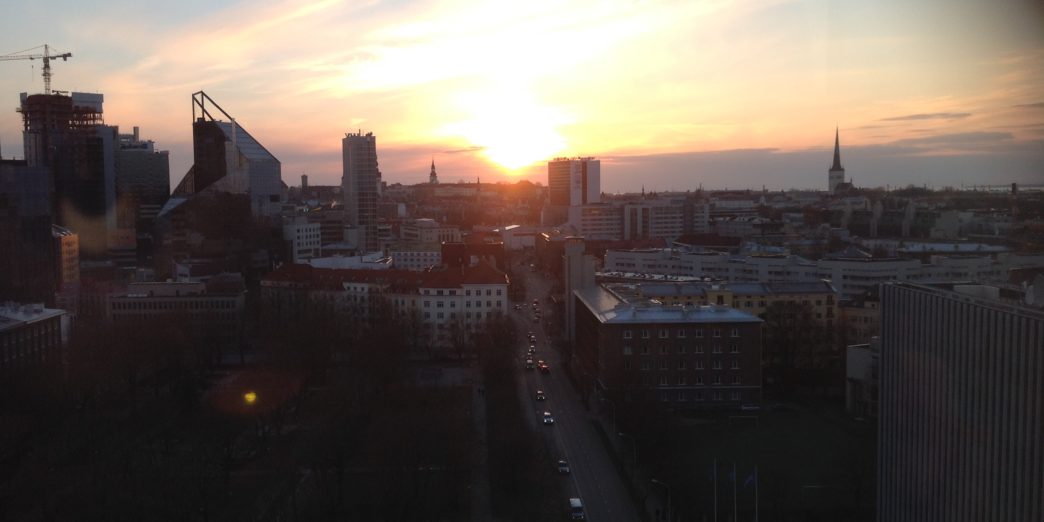 a sunset over a city