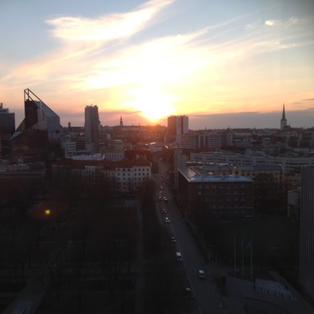 a sunset over a city