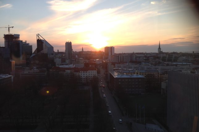 a sunset over a city