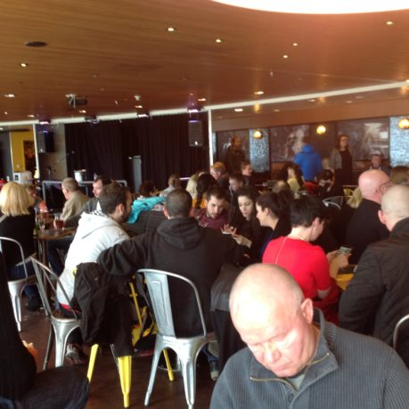 a group of people sitting in a room