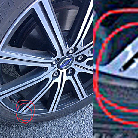 Scratch on rental car wheel